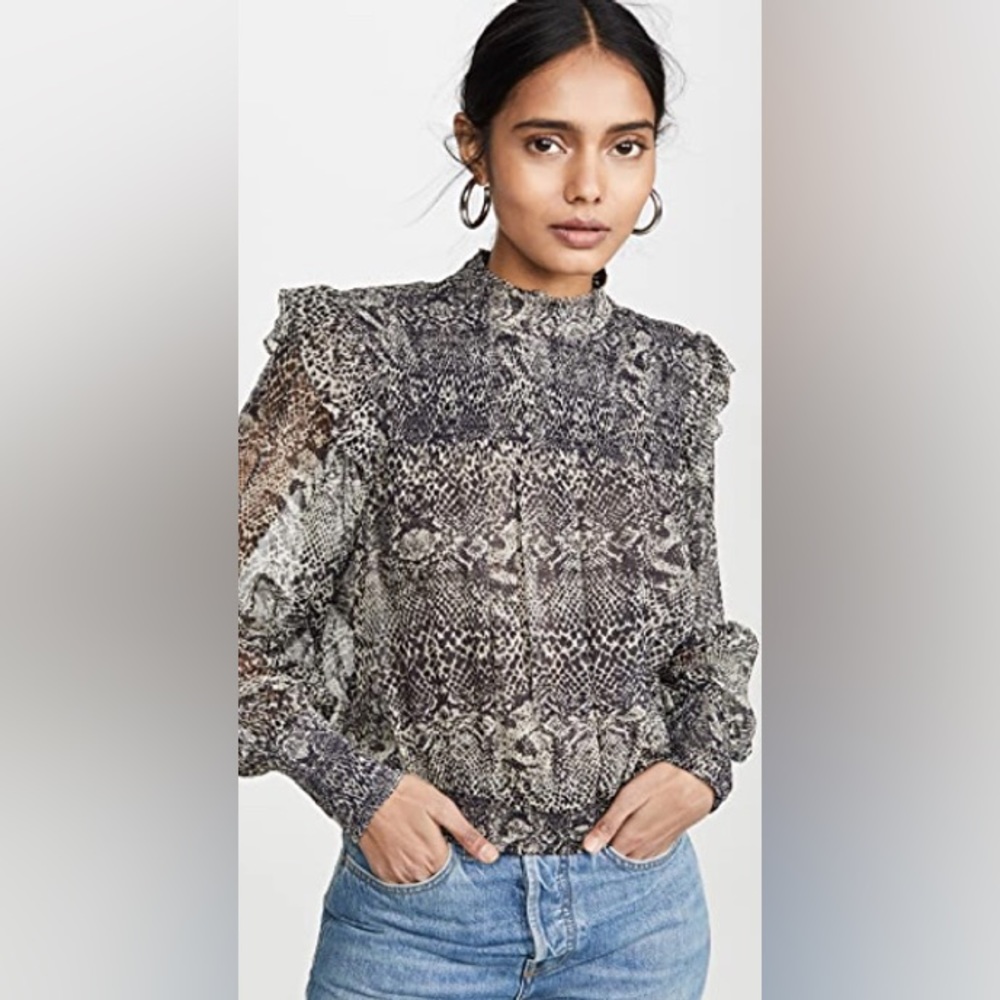 Super stylish sheer blouse by Free People